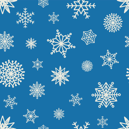 Seamless pattern hand drawn white snow flakes on blue, simple winter background. design for holiday greeting cards and invitations of the Merry Christmas and Happy New Year, winter holidays.のイラスト素材