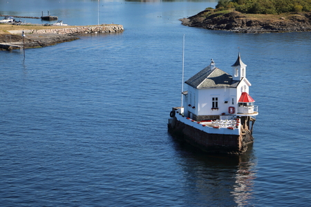 Little house in the sea nearby harbor of Osloの写真素材