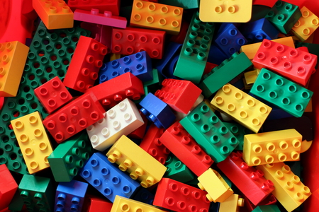 multi colored duplo brick in a boxの写真素材