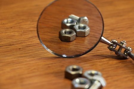 Nuts and bolts seen in a mirror inspection deviceの写真素材