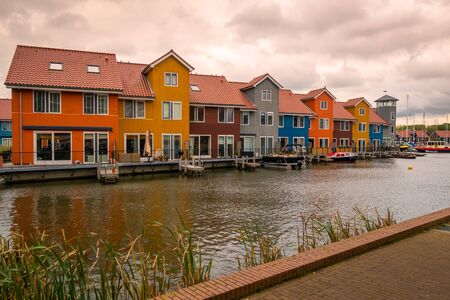 Beautiful houses in the Netherlands, Groningen province, city Groningen neighborhood is called Reitdiephavenの写真素材