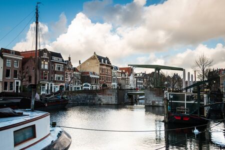 Photo of the historic Delfshaven with beautiful colored clouds in Rotterdam,の写真素材