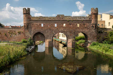 The Berkelpoort is an old water gate and part of the old city wall in the Hanseatic city of Zutphen in the Netherlands, province of Gelderlandの写真素材