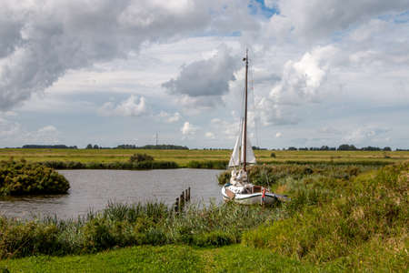 The national park lauwersmeer located in the north of the Netherlands in the provinces of Groningen and Friesland, it is a bird and water paradise.の写真素材