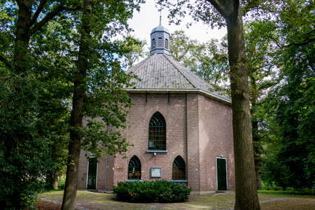 A protestant church in the small village called Haarlo, the church is nicknamed 'the kuntjespot', it is a monument in the Netherlandsの写真素材