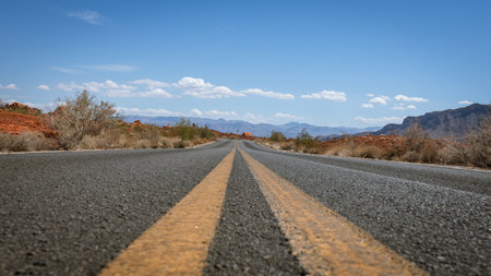 Driving and walking through the Valley of Fire State Park, formed by shifting sand dunes to red sandstone formations, also called Aztec Sandstone, Nevada, USAの写真素材