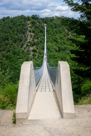 The Geierlay suspension bridge, the longest and most spectacular pedestrian bridge in Germany, near...