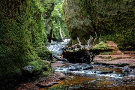 The Devils Pulpit a beautiful gorge in the Scottish landscape close to Loch Lomond and the Trossachs National Park. A former filming location for the Outlander seriesの写真素材