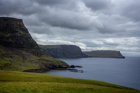 The beautiful rocky coastline at the very tip of the Duirinish Peninsula right next to Neist Point and used several times as a film location, Scotlandの写真素材