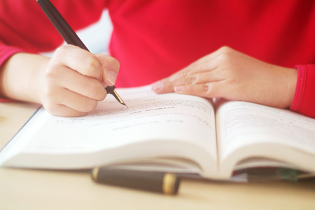 Girl doing homeworkのeditorial素材