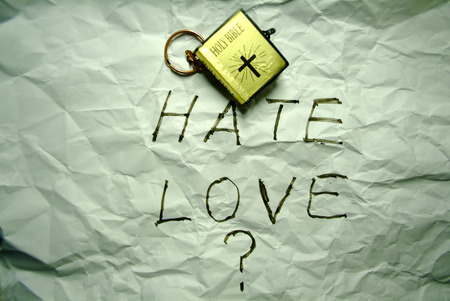 love and hate with bible besideの写真素材