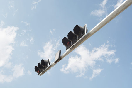 traffic light under the blue sky and white clouds