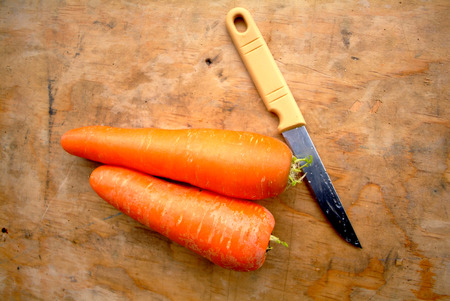 Raw carrot and knifeの写真素材