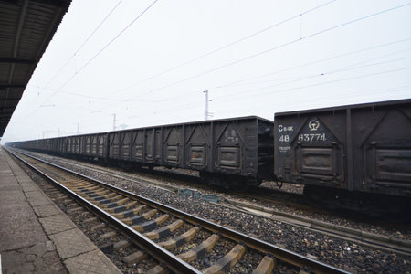 Train passing train stationのeditorial素材