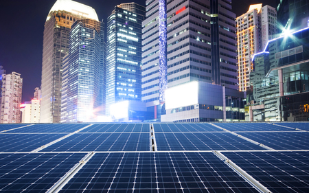 Solar panel and cityの写真素材