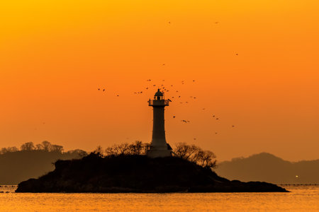 A sunrise in the sea at Sagungdumi Port in Masan, Koreaの写真素材