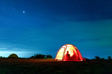 The night of the starry camping site in the beautiful night sky