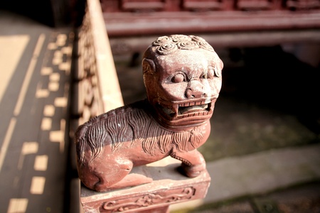 Sculpture of mystical creature on railingの写真素材