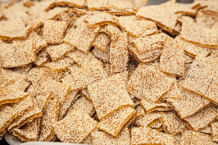   sesame seeds mixed with sugar syrup の写真素材