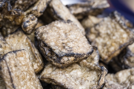 smelly tofu fried with oil and packed in the dishの写真素材