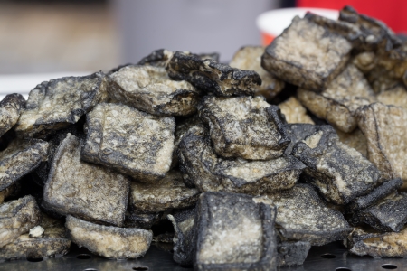 smelly tofu fried with oil and packed in the dishの写真素材