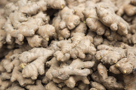 Ginger stacked in the market place.の写真素材