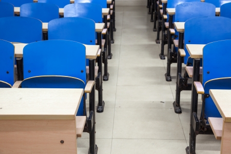 empty classroom with tables and chairsの写真素材