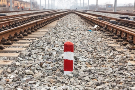 railroad metal track with track bedの写真素材