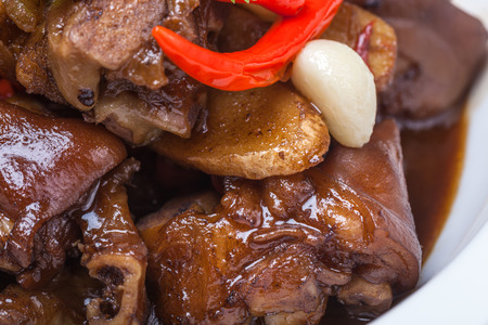 pork feet with chili and garlic stewedの写真素材