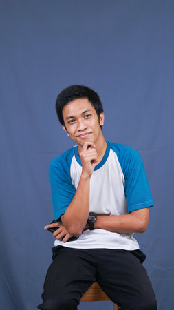 asian man stylish in studio with casual clothesの写真素材