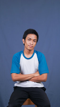 asian man stylish in studio with casual clothesの写真素材