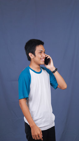 asian man calling and expressionの写真素材