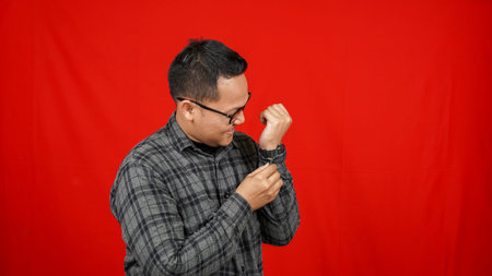 Funny Asian man stylish isolated red background