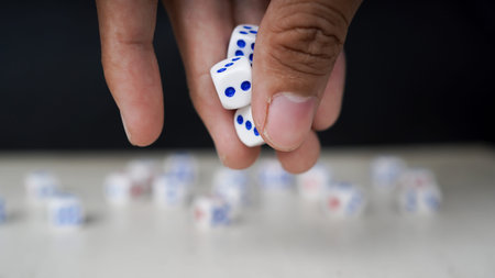 Dice arranged by hand on top