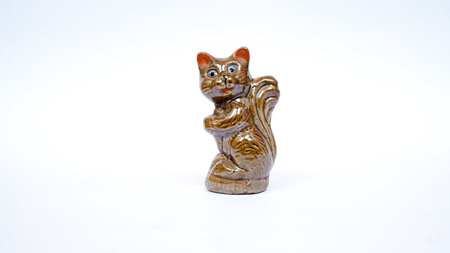 cat statue isolated white background for room decorationの写真素材