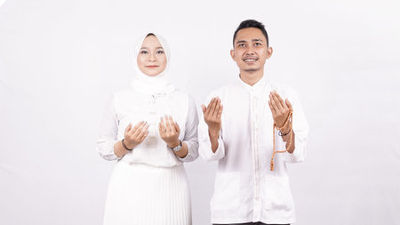 Asian molem couple pray isolated white background