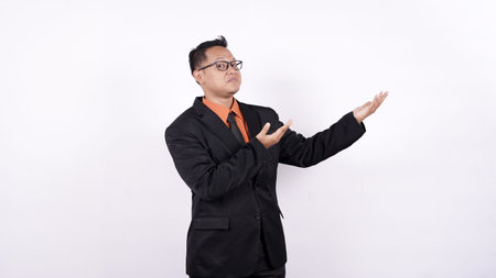 asian business man pointed blank space isolated white background
