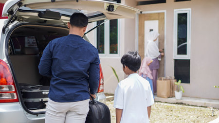Muslim families travel back to their hometowns by car to celebrate Eid