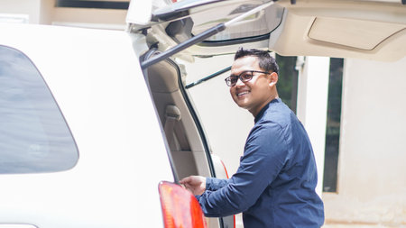 Muslim families travel back to their hometowns by car to celebrate Eidの写真素材