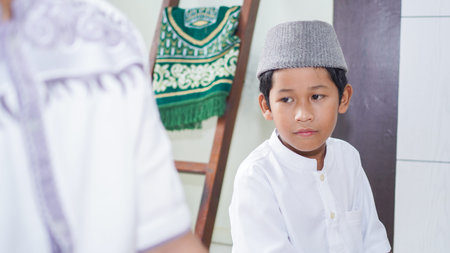 a Muslim family consisting of parents and children perform greeting movements during prayer