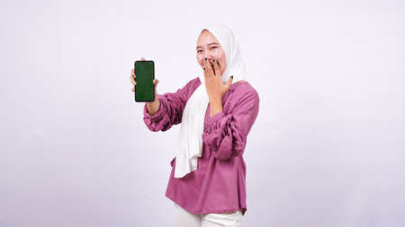 beautiful women hijab standing with green screenの写真素材