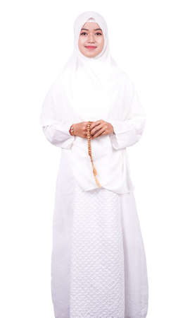 Asian women muslim pray on a white backgroundの写真素材