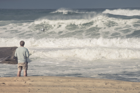 drone pilot on the beach of capbretonの写真素材