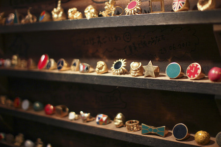 geolden jewelry in a shelfの写真素材