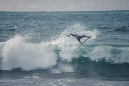 surfer performs a 360