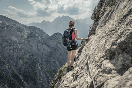 climbing woman at Mannlsteig, germanyの写真素材