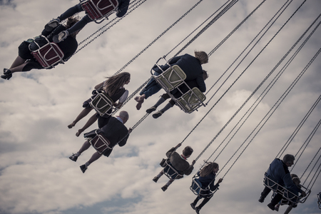 enjoying the chairoplane at oktoberfest 2015 oktoberfest 2015の写真素材