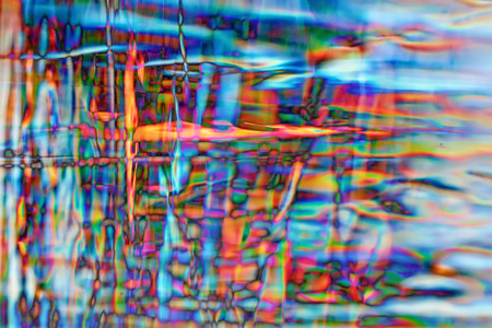 colorful light in a block of iceの写真素材