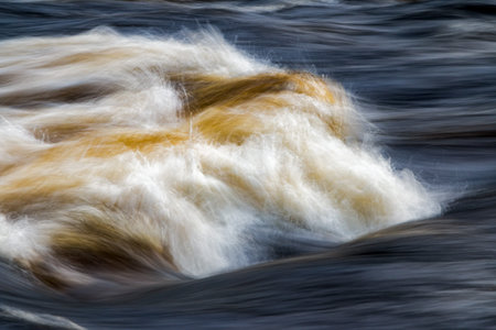 fast moving water in mountain river in sweden