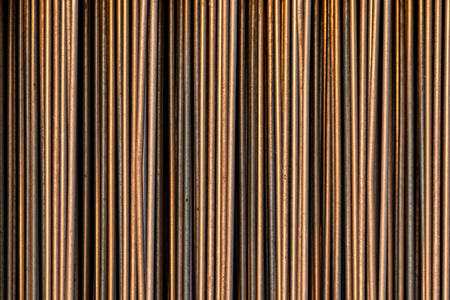 metal bars in a row at dawnの写真素材